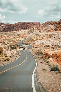 A vertical view of layered red sandstone in Valley of Fire State Park, Nevada.