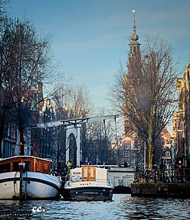 A canal and its houseboats in Amsterdam.