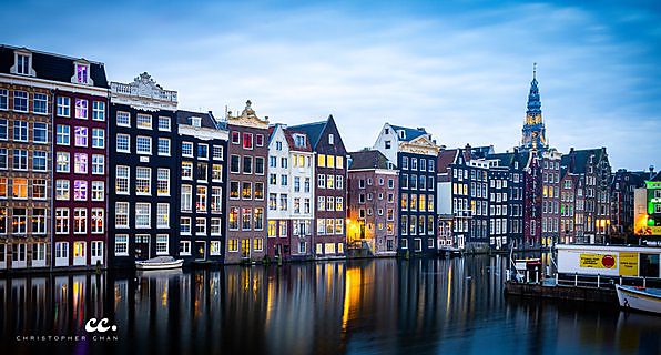 Quiet canals at sunrise in Amsterdam.