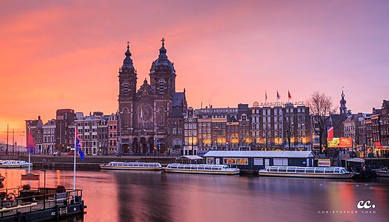 Quiet canals at sunrise in Amsterdam.